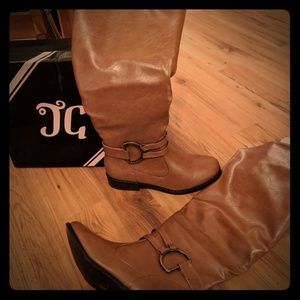 Tall, flat, brown boots